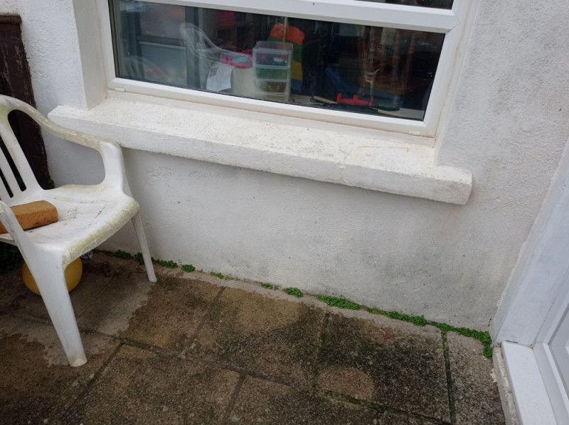 Raised ground level at rear