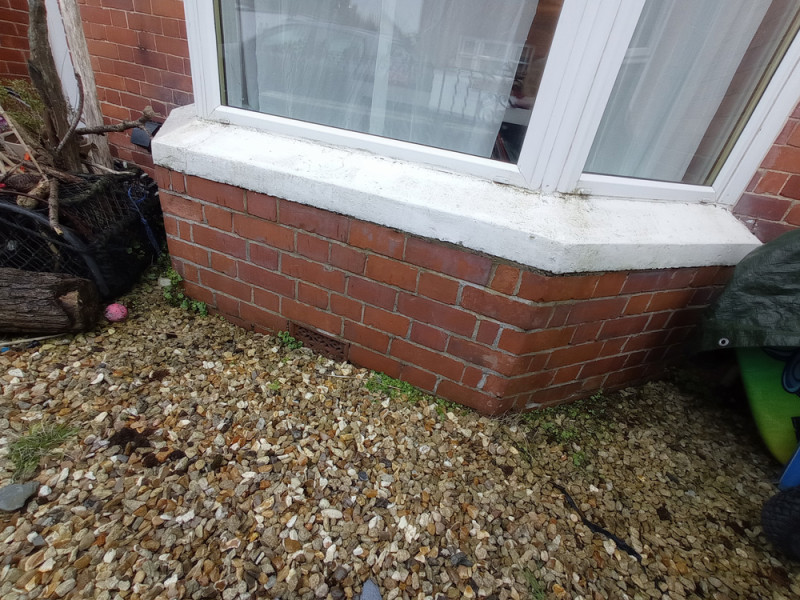 Raised ground level at front